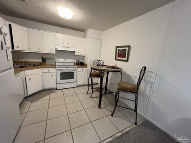 COME AND SEE this centrally located condominium in the bustling - photo 8