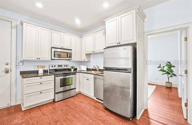 Welcome home to this luxurious lock-and-leave condominium in - photo 34
