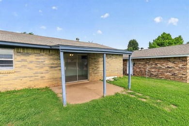 Welcome home to 811 Ridgeway Drive in Yukon! This charming - photo 29