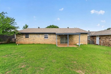 Welcome home to 811 Ridgeway Drive in Yukon! This charming - photo 30