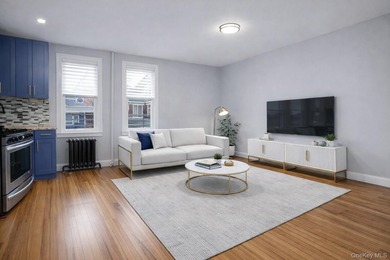 Presenting a beautifully renovated four-level, two-family - photo 3
