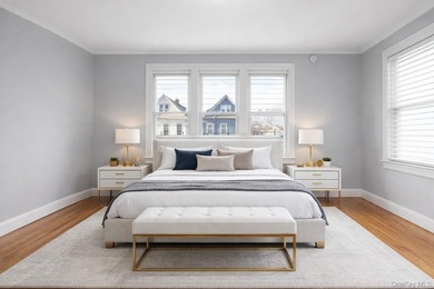 Presenting a beautifully renovated four-level, two-family - photo 7