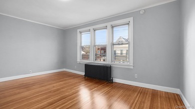 Presenting a beautifully renovated four-level, two-family - photo 8