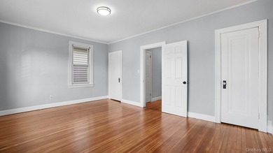 Presenting a beautifully renovated four-level, two-family - photo 9