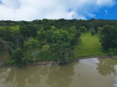 Pristine Waterfront 1+ Acre Lot in Gated Subdivision on RC Lake! - photo 18