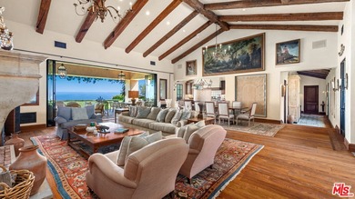 Tucked away behind gates atop the Malibu hills, this enchanting - photo 11