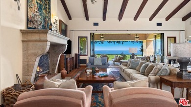 Tucked away behind gates atop the Malibu hills, this enchanting - photo 12