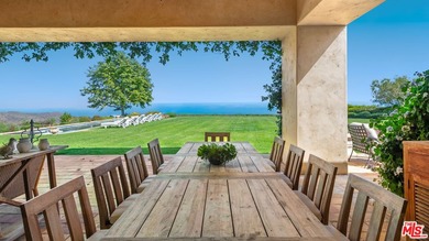 Tucked away behind gates atop the Malibu hills, this enchanting - photo 15