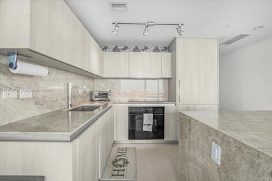 Welcome to One Paraiso #3306, a private elevatored 3 bed, 3.5