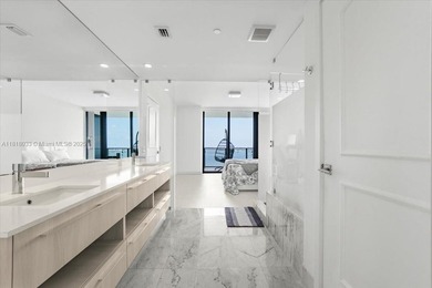 Welcome to One Paraiso #3306, a private elevatored 3 bed, 3.5