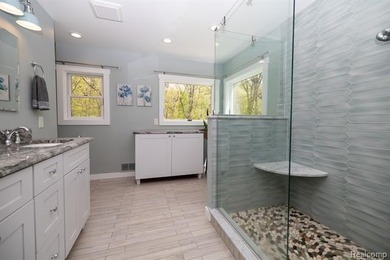 Nestled deep within 4.3 breathtaking wooded acres and offering - photo 22