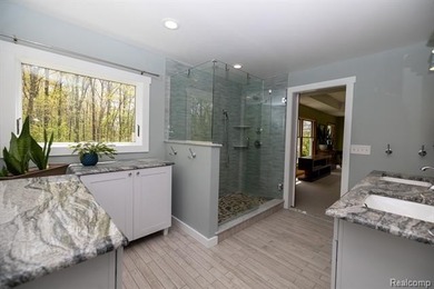 Nestled deep within 4.3 breathtaking wooded acres and offering - photo 23