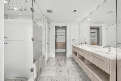 Welcome to One Paraiso #3306, a private elevatored 3 bed, 3.5