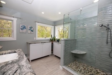 Nestled deep within 4.3 breathtaking wooded acres and offering - photo 24