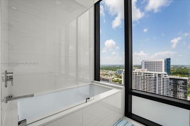 Welcome to One Paraiso #3306, a private elevatored 3 bed, 3.5