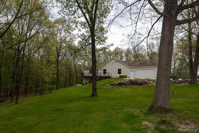 Nestled deep within 4.3 breathtaking wooded acres and offering - photo 43