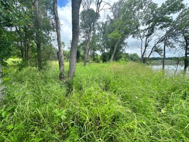 Pristine Waterfront 1+ Acre Lot in Gated Subdivision on RC Lake! - photo 10