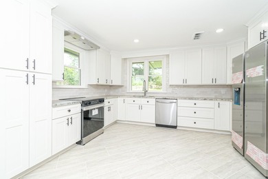 Completely renovated and move-in ready! This beautifully updated - photo 17
