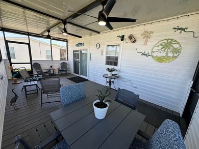 Experience comfort, convenience, and coastal proximity in this - photo 8