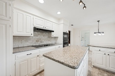 Welcome home to this beautiful 4-bedroom, 2.5-bath home located - photo 6