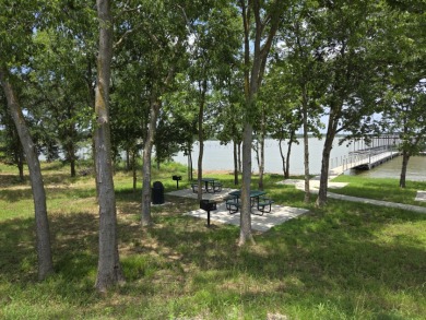 Pristine Waterfront 1+ Acre Lot in Gated Subdivision on RC Lake! - photo 27