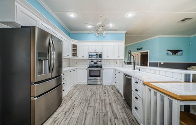 5127 Bay Blvd, Port Richey, FL 34668 Waterfront Home with Canal - photo 15