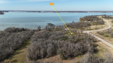 Pristine Waterfront 1+ Acre Lot in Gated Subdivision on RC Lake! - photo 3