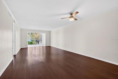 Welcome to easy first-floor living in this bright corner unit - photo 8