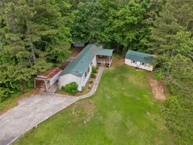Lake Home For Sale in Acworth, Georgia