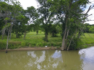 Pristine Waterfront 1+ Acre Lot in Gated Subdivision on RC Lake! - photo 4