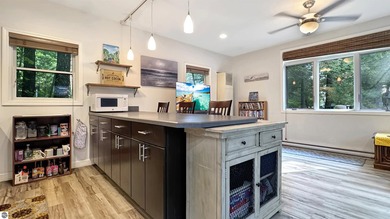 This two-bedroom, one-bath home is located across the street - photo 12