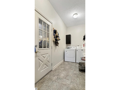 This two-bedroom, one-bath home is located across the street - photo 15