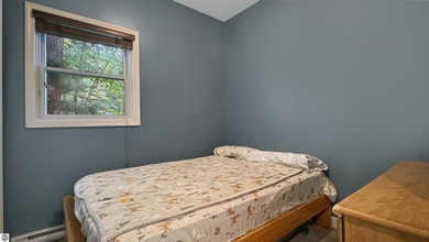 This two-bedroom, one-bath home is located across the street - photo 18