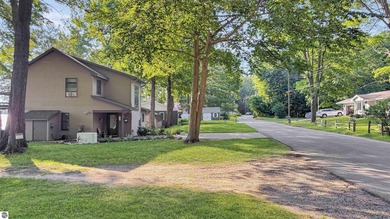 This two-bedroom, one-bath home is located across the street - photo 29