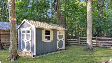 This two-bedroom, one-bath home is located across the street - photo 30
