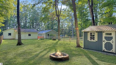 This two-bedroom, one-bath home is located across the street - photo 32