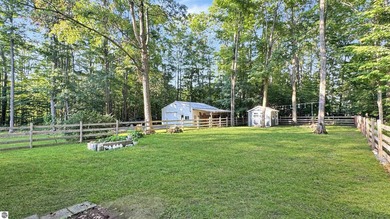 This two-bedroom, one-bath home is located across the street - photo 33