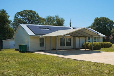 **FRESHLY RENOVATED/JUNE 2026** This move-in-ready home features - photo 2