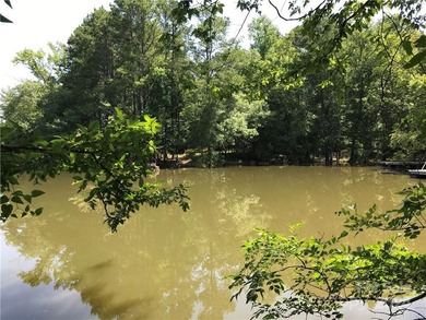 Beautiful homesite with approximately 120' 'feet of waterfront - photo 13