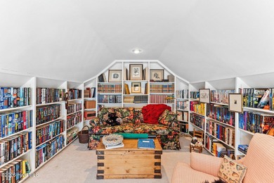 Nestled on approximately 1.4 acres at the end of a quiet