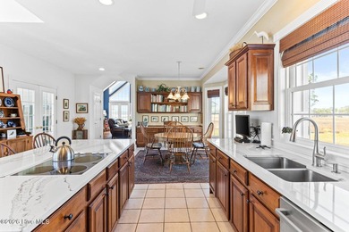 Nestled on approximately 1.4 acres at the end of a quiet