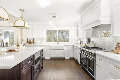 Escape to this stunning, recently renovated custom retreat where - photo 10