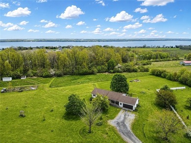 Set well back from the road on 9.8 scenic acres, this renovated - photo 1