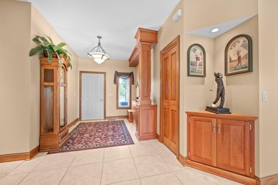 This stately patio home built by Larson Builders overlooks the - photo 3