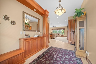 This stately patio home built by Larson Builders overlooks the - photo 4