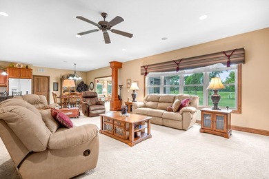 This stately patio home built by Larson Builders overlooks the - photo 7