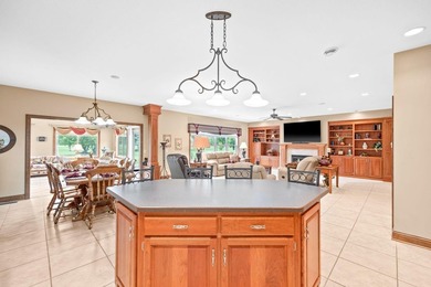 This stately patio home built by Larson Builders overlooks the - photo 10