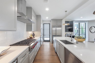 Experience elevated living in this stunning first floor, corner - photo 11