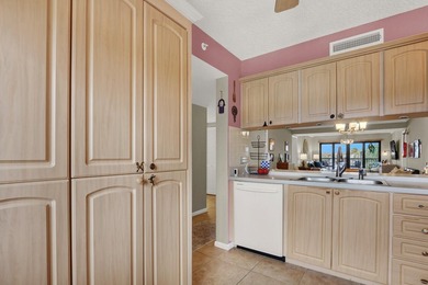 This two-bedroom, two-bath condominium offers a relaxed - photo 23