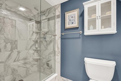 This two-bedroom, two-bath condominium offers a relaxed - photo 29